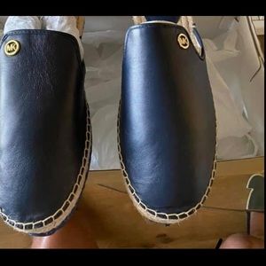 Michael Kors blue slides. Never worn.